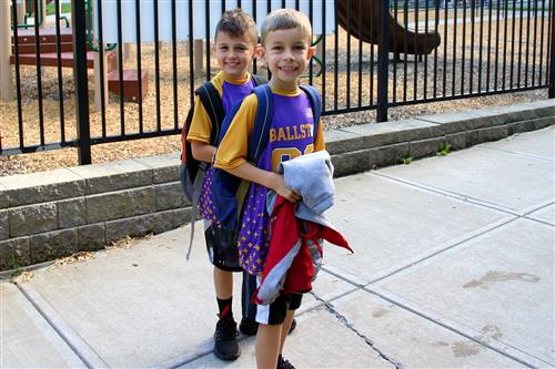 Young students walking in Halloween costumes