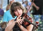 Girl playing a violin.